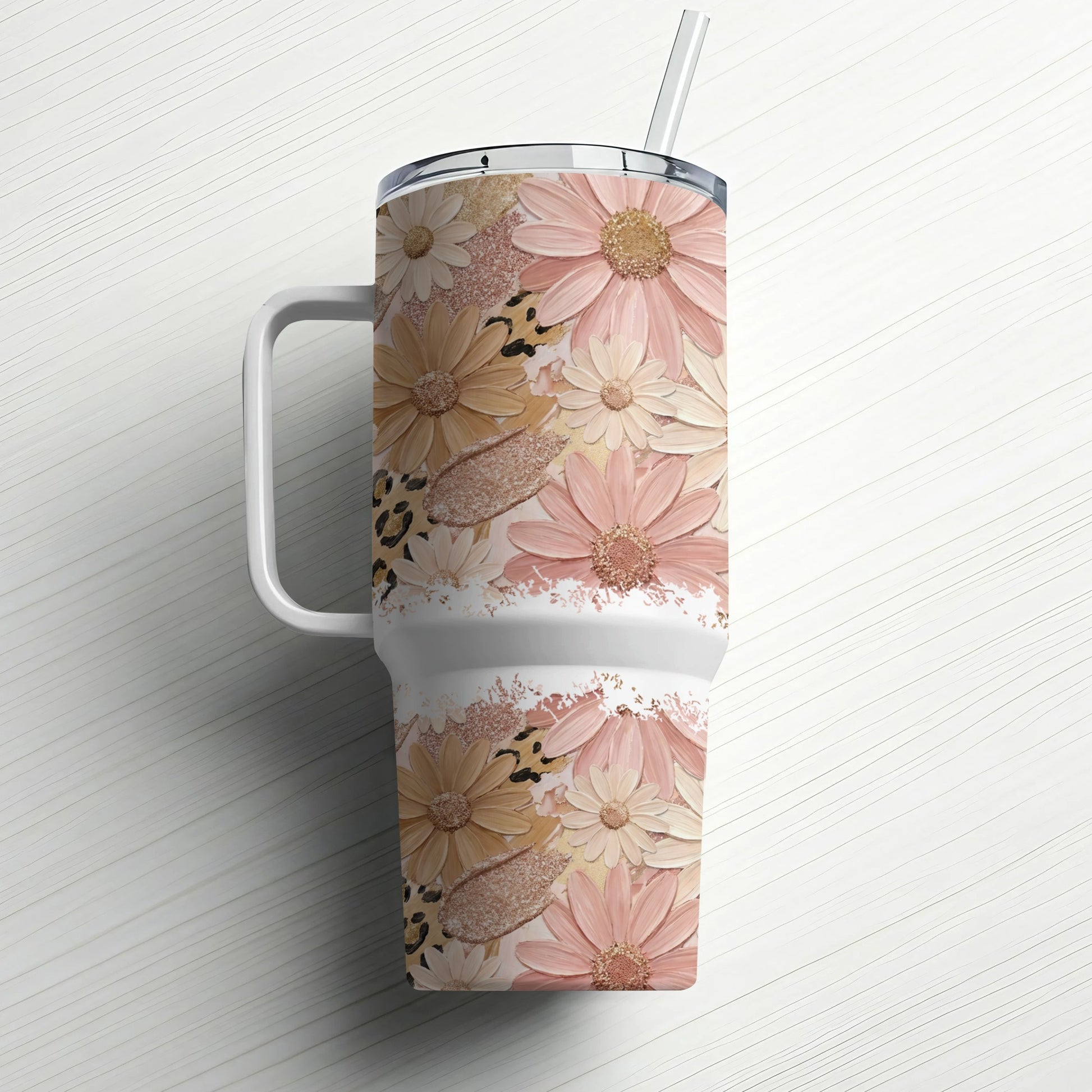 Floral and leopard print tumbler with straw.