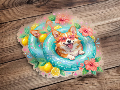 Corgi in heart sunglasses floats in pool ring with lemons and flowers.
