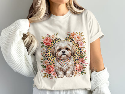 White t-shirt with a shih tzu and floral print with leopard spots.
