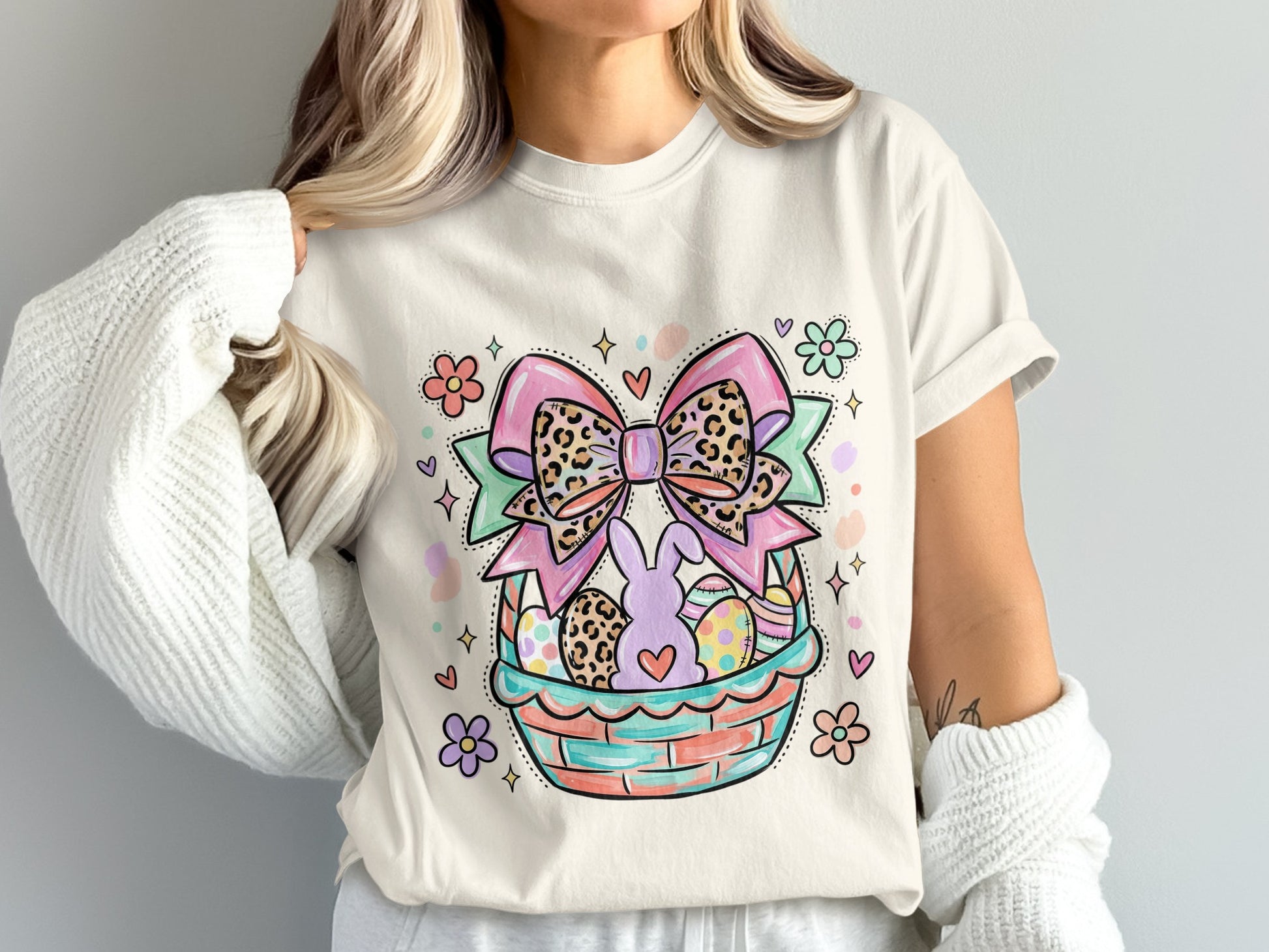 Easter basket with a bunny, eggs, and a large leopard print bow.