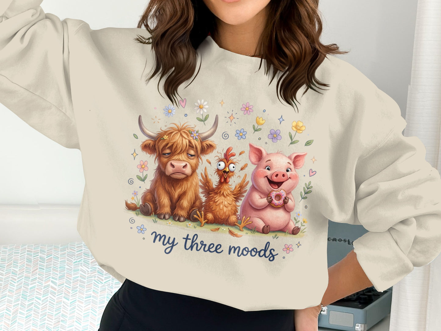 Cow, chicken, and pig wearing donut, "my three moods" graphic on sweatshirt.