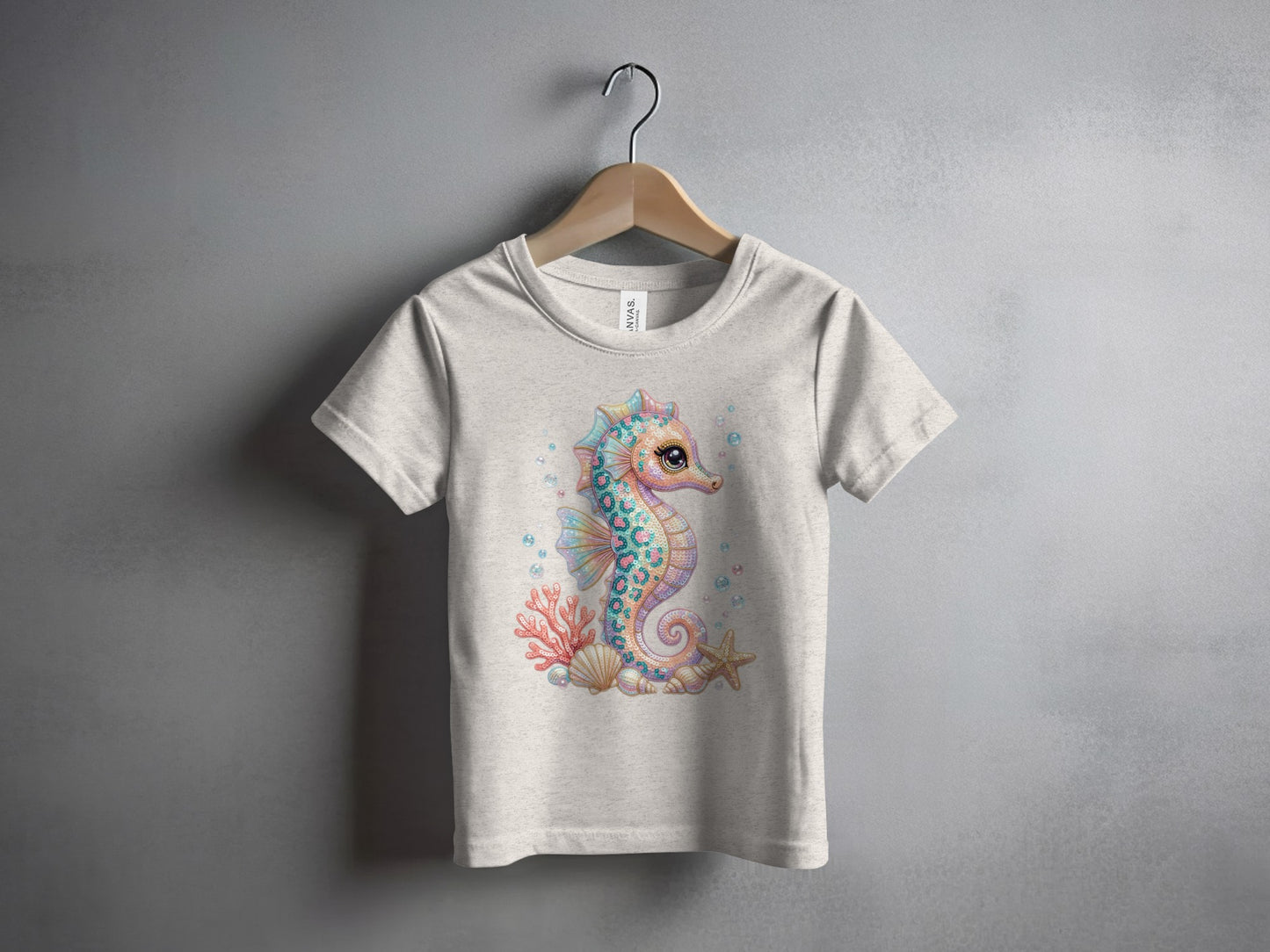 T-shirt with watercolor seahorse, starfish, and coral design.