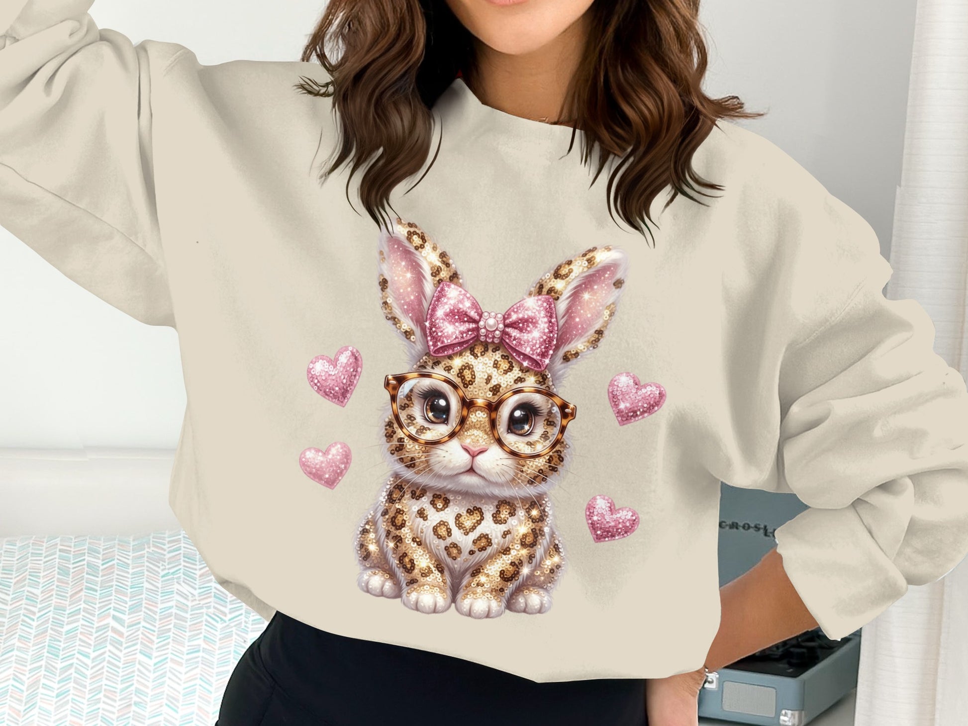 Cream sweatshirt with sequined leopard bunny graphic and pink glitter hearts.