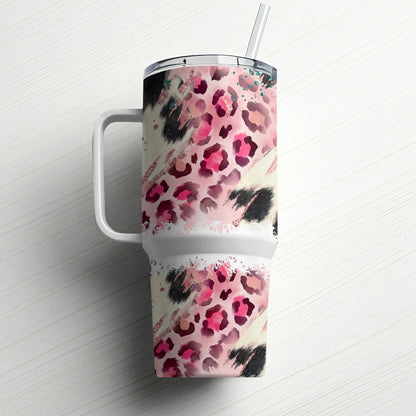 Pink and black leopard print tumbler with handle and straw.