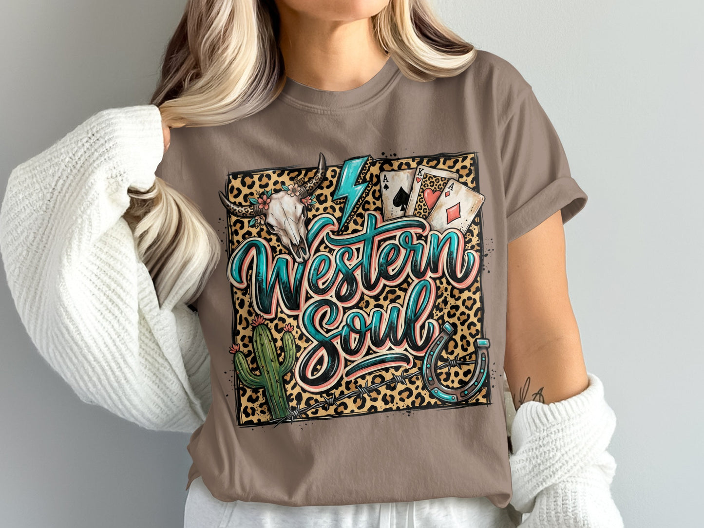 T-shirt with "Western Soul" text, cow skull, cacti, aces, and horseshoe.