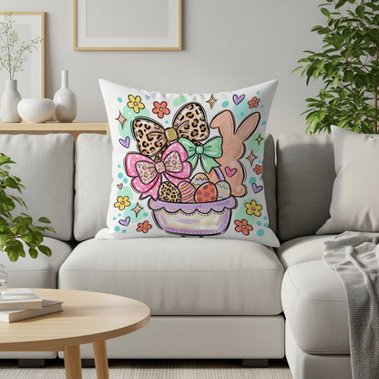 Easter basket with bows, eggs, and bunny, on a sofa.