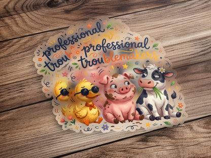 Cute cartoon duck, pig, and cow stickers with "professional troublemakers" text.