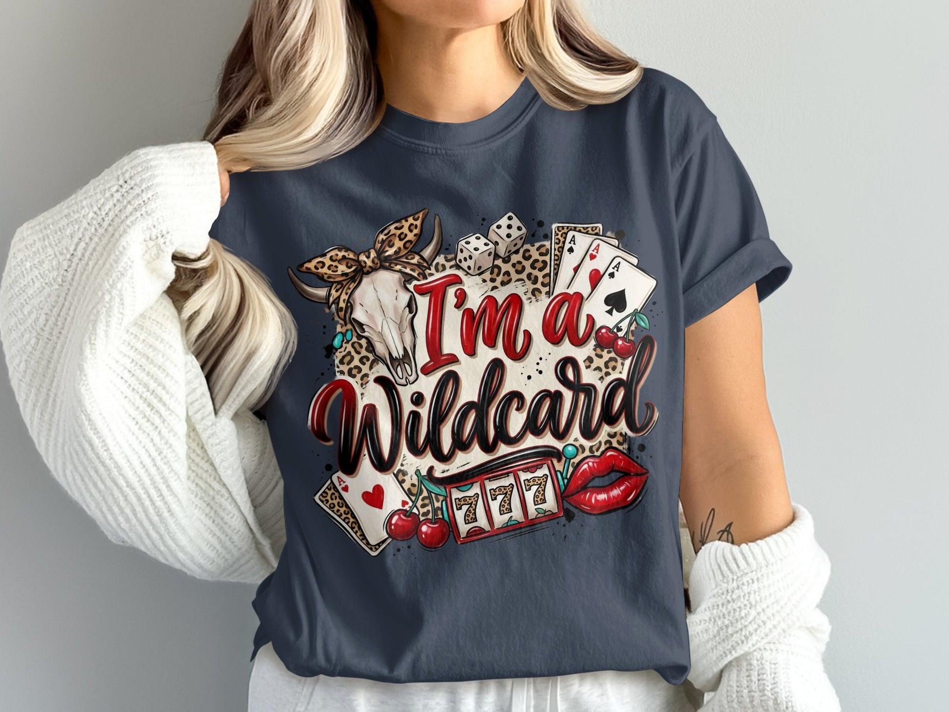 Dark t-shirt with "I'm a Wildcard" text, skull, cherries, dice, cards, and slot machine.
