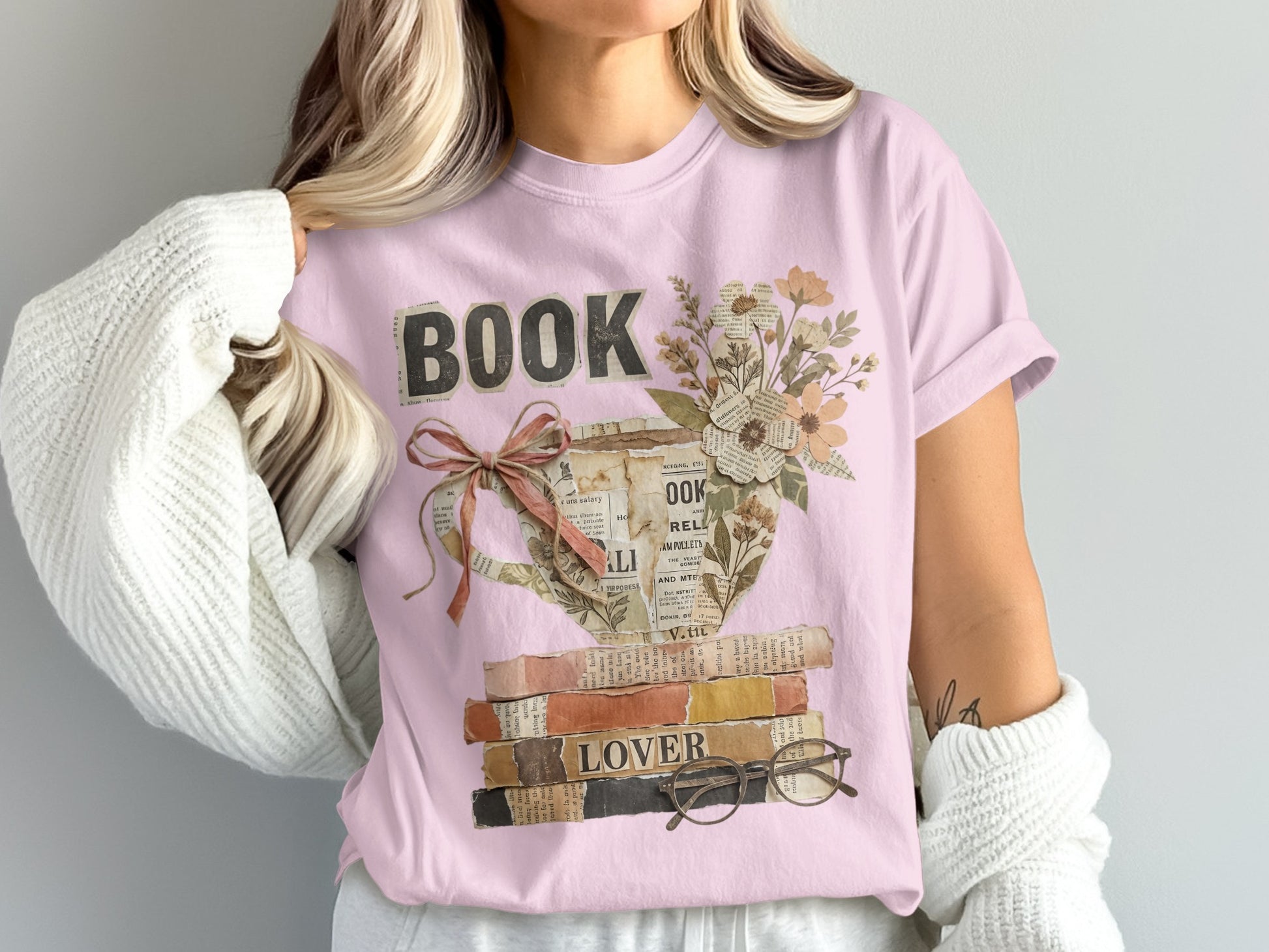 Pink t-shirt with "BOOK LOVER" text and floral teacup design.