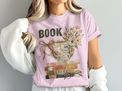 Pink t-shirt with "BOOK LOVER" text and floral teacup design.