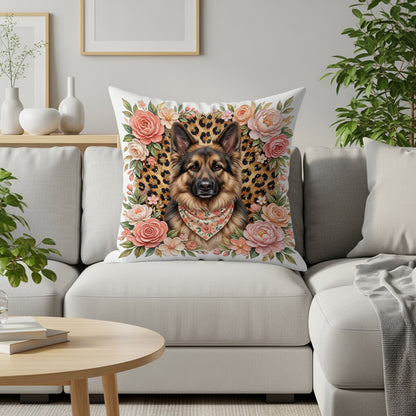 German Shepherd wearing a bandana on a decorative pillow with floral accents.