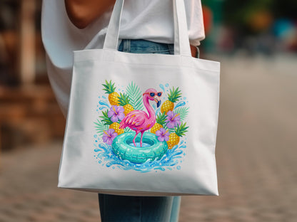 Pink flamingo with sunglasses on inner tube, surrounded by pineapples and flowers.