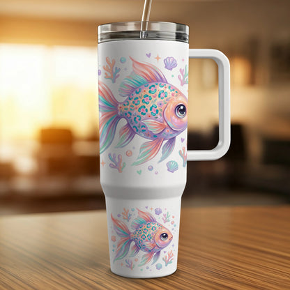 White tumbler with colorful fish and seashell pattern, featuring a handle and straw.