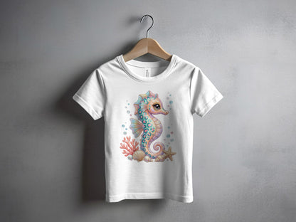 White t-shirt with colorful cartoon seahorse, starfish, and coral graphic.