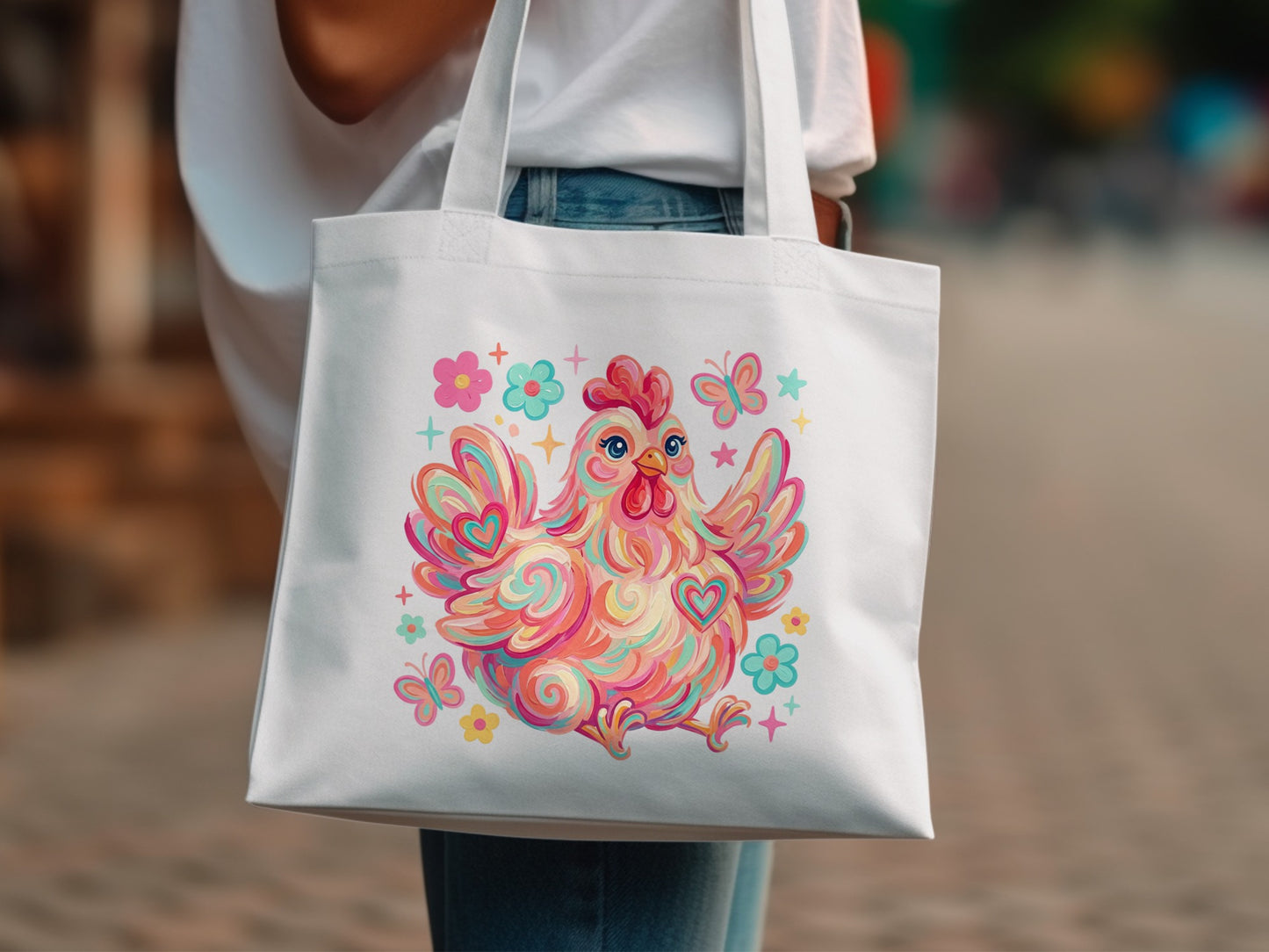 White tote bag with colorful chicken and flower design.