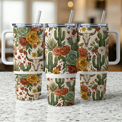 Three patterned tumblers with floral and skull designs.
