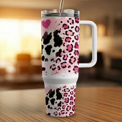 Tumbler with pink leopard and cow print, topped with a pink glitter heart.