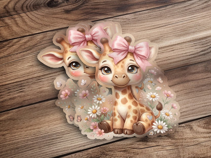 Two cartoon giraffes with pink bows sit among flowers.