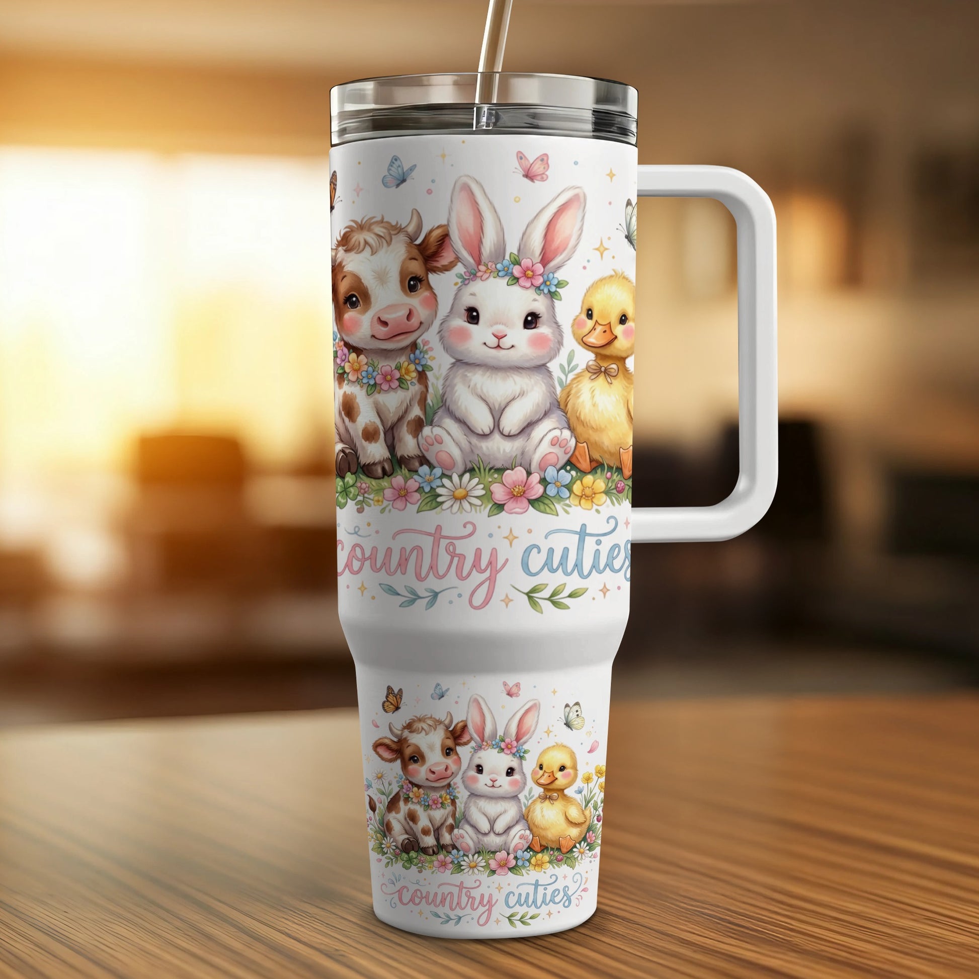 Country cuties tumbler with cow, rabbit, and duck illustrations.