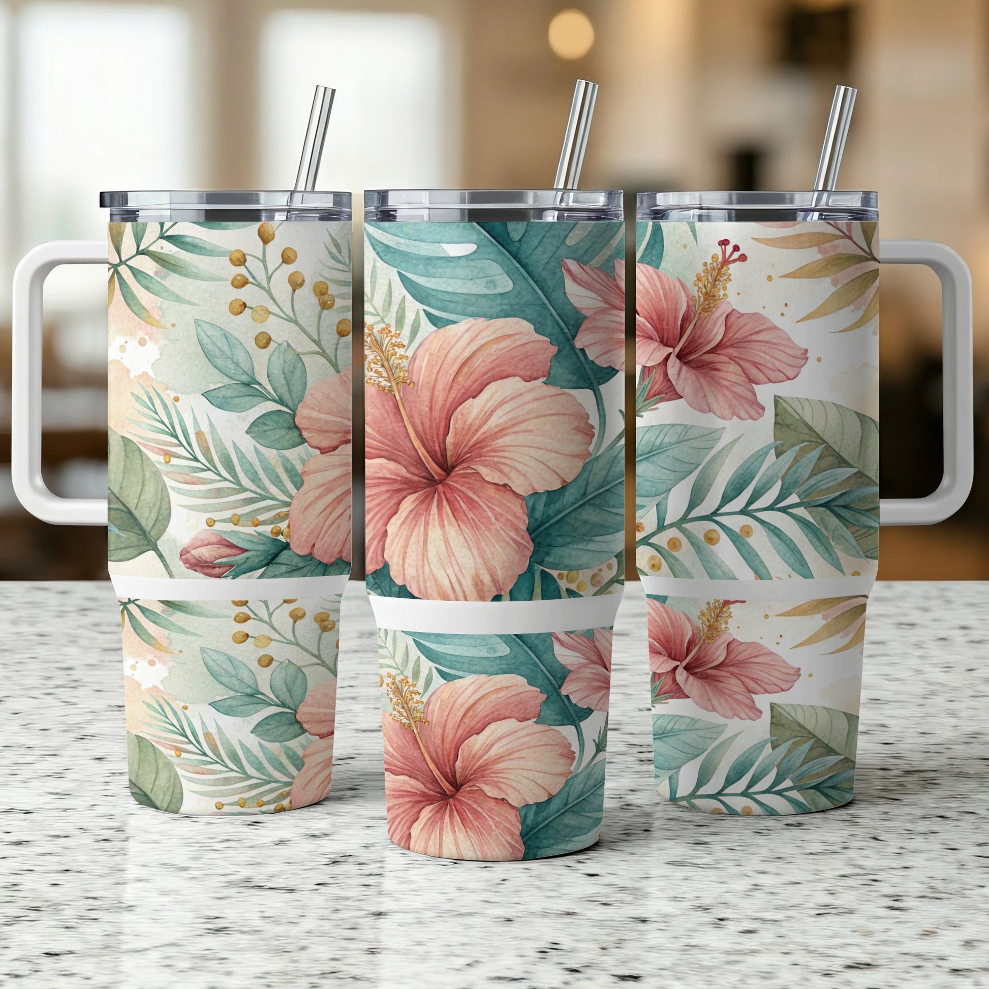 Three travel tumblers with a watercolor hibiscus floral pattern and handles.