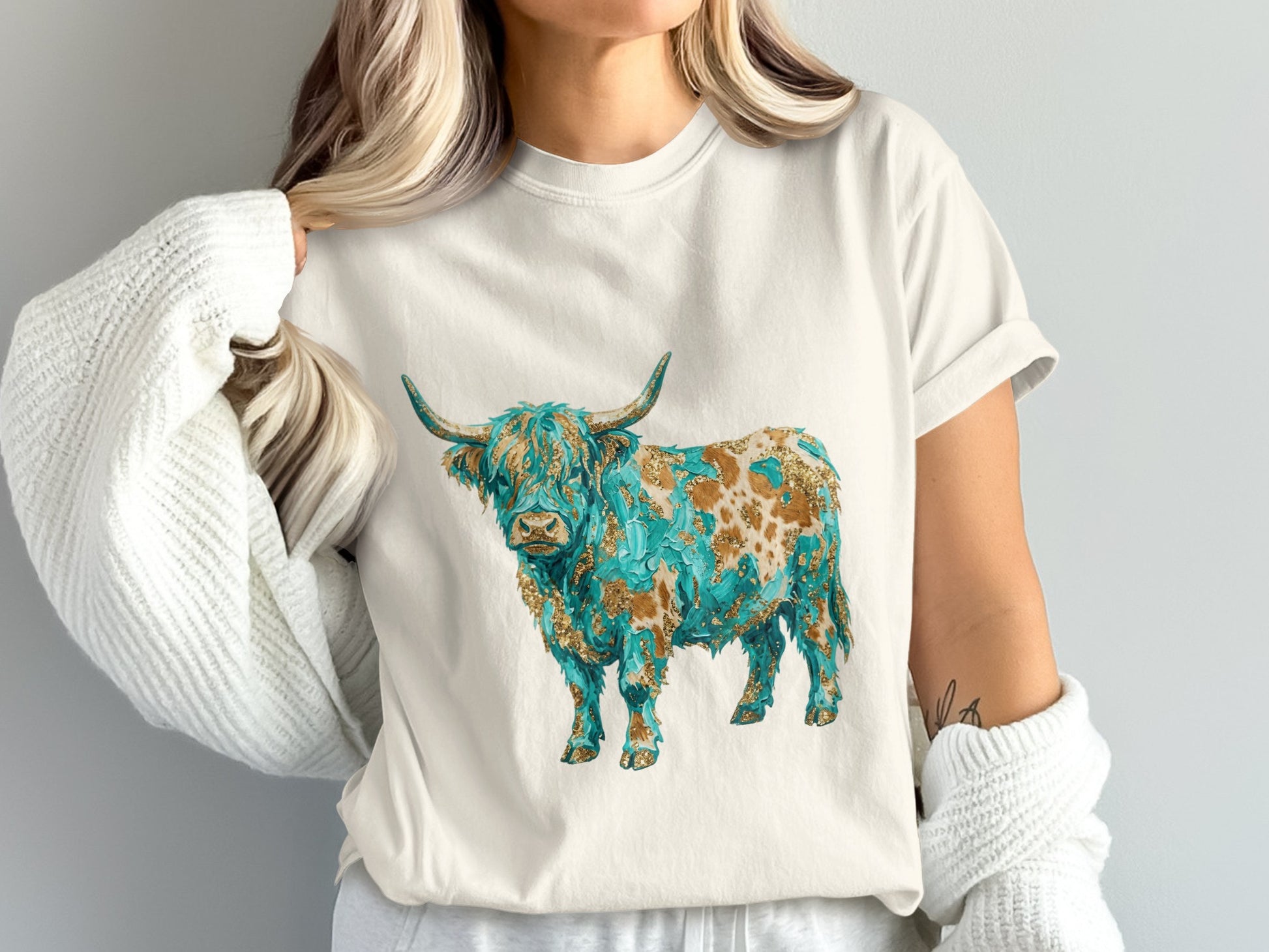White t-shirt with abstract painting of a Highland cow.