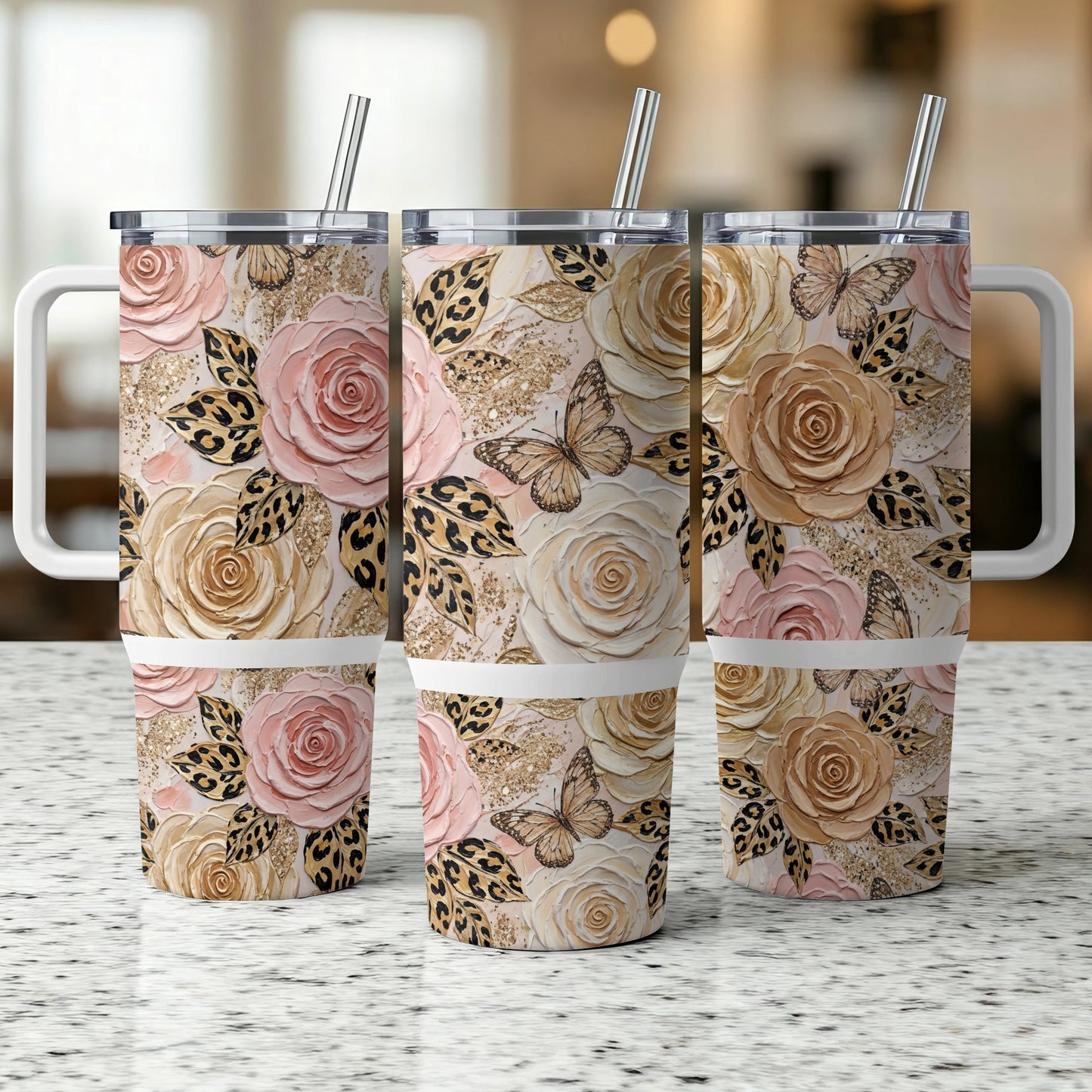 Three tumblers with roses, butterflies, and leopard print.