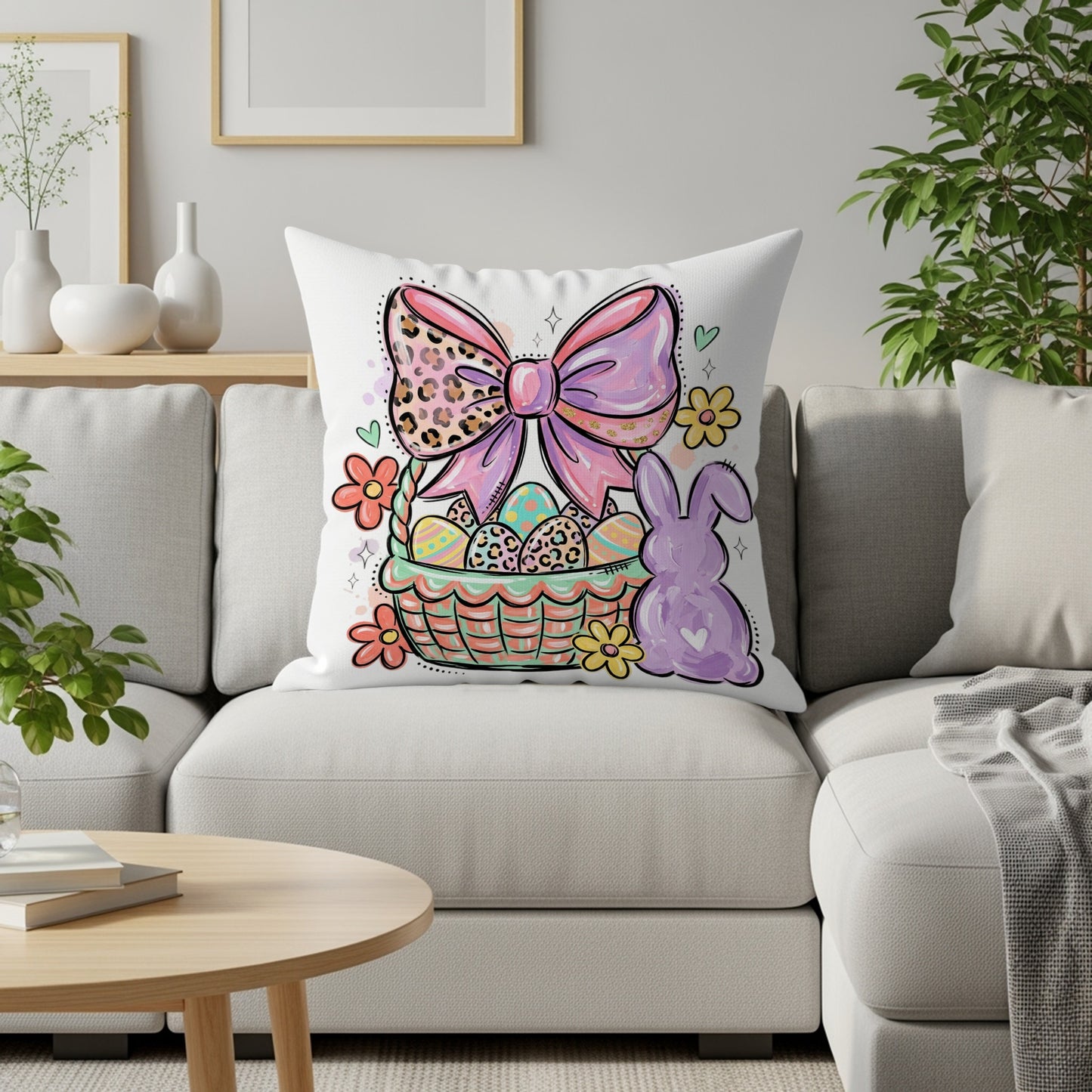 Easter basket with bow, eggs, and bunny illustration on a pillow.