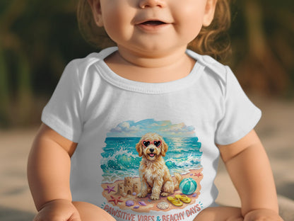 Baby in white onesie with a surfing dog graphic and "Pawsitive Vibes" text.