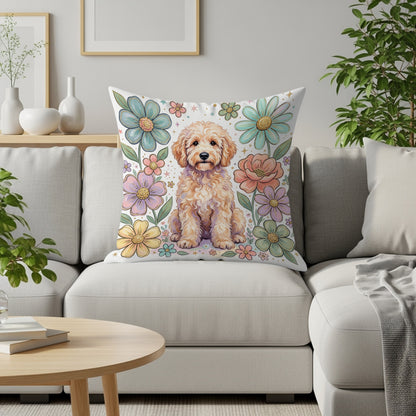 Fluffy light brown dog sits amidst a floral pattern on a decorative pillow.