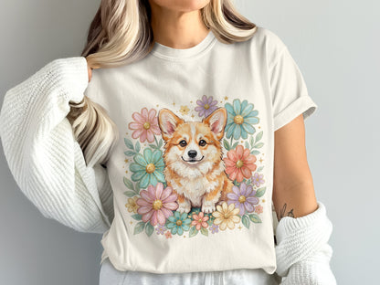 Cream t-shirt with a smiling corgi and pastel flowers.