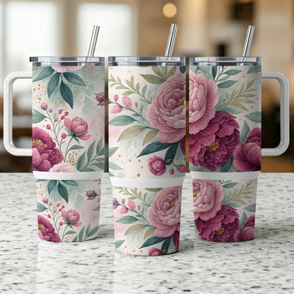Three tumblers with pink peony floral pattern and straw.