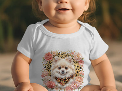 Baby wearing white onesie with Pomeranian dog and floral design.