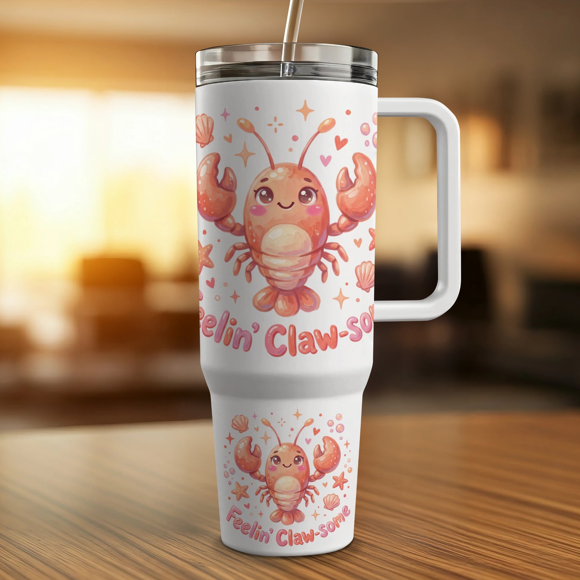 White tumbler with a cute lobster design and "Feelin' Claw-some" text.