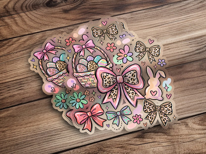 Easter-themed stickers with baskets, eggs, bunnies, and bows on wood.