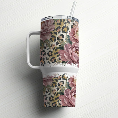 Tumbler with floral and leopard print patterns, featuring a white handle and straw.