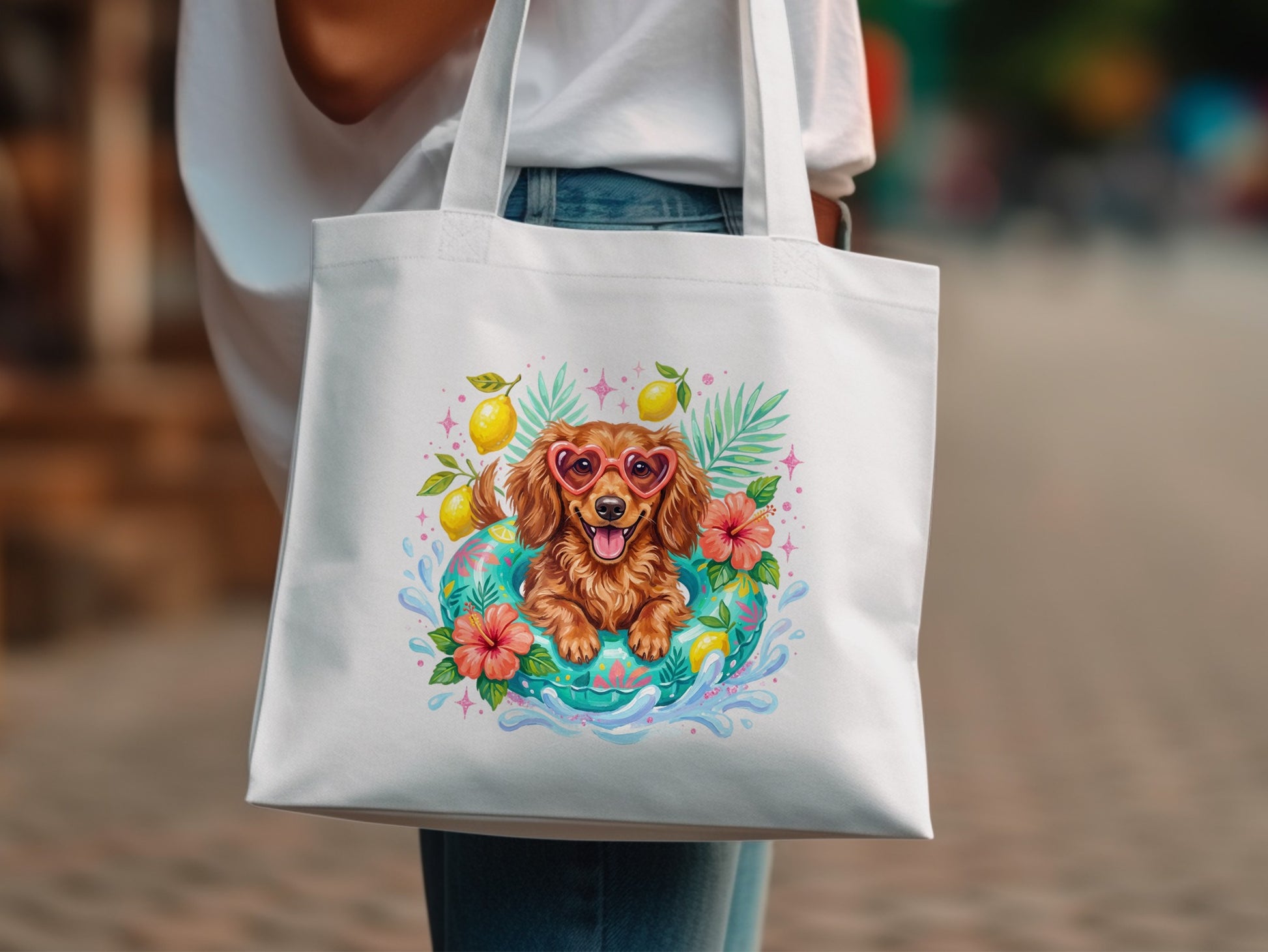 Tote bag with Dachshund wearing heart sunglasses in a float surrounded by lemons and flowers.