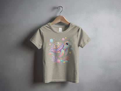 T-shirt featuring a whimsical watercolor sea turtle with coral and bubbles.