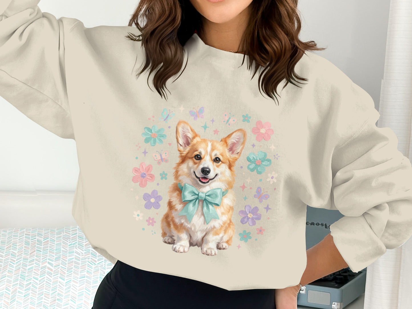 Corgo with pastel flowers and bow on crewneck sweatshirt.