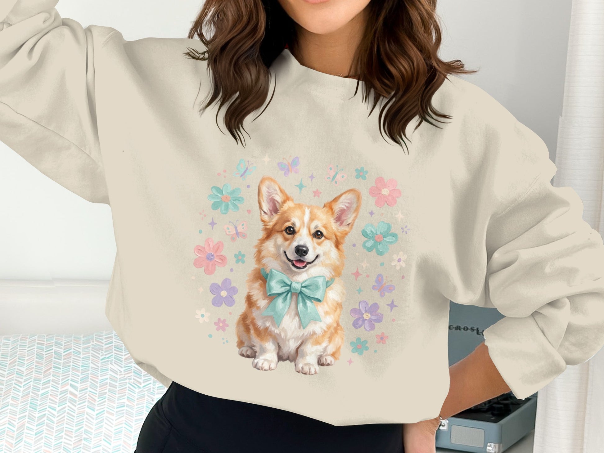 Corgo with pastel flowers and bow on crewneck sweatshirt.