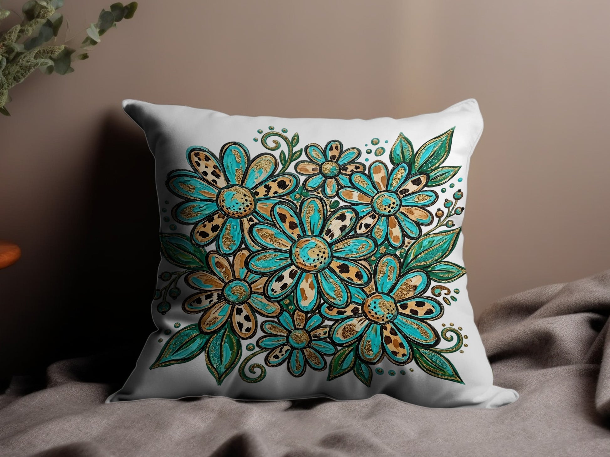 White throw pillow with turquoise and brown floral pattern.