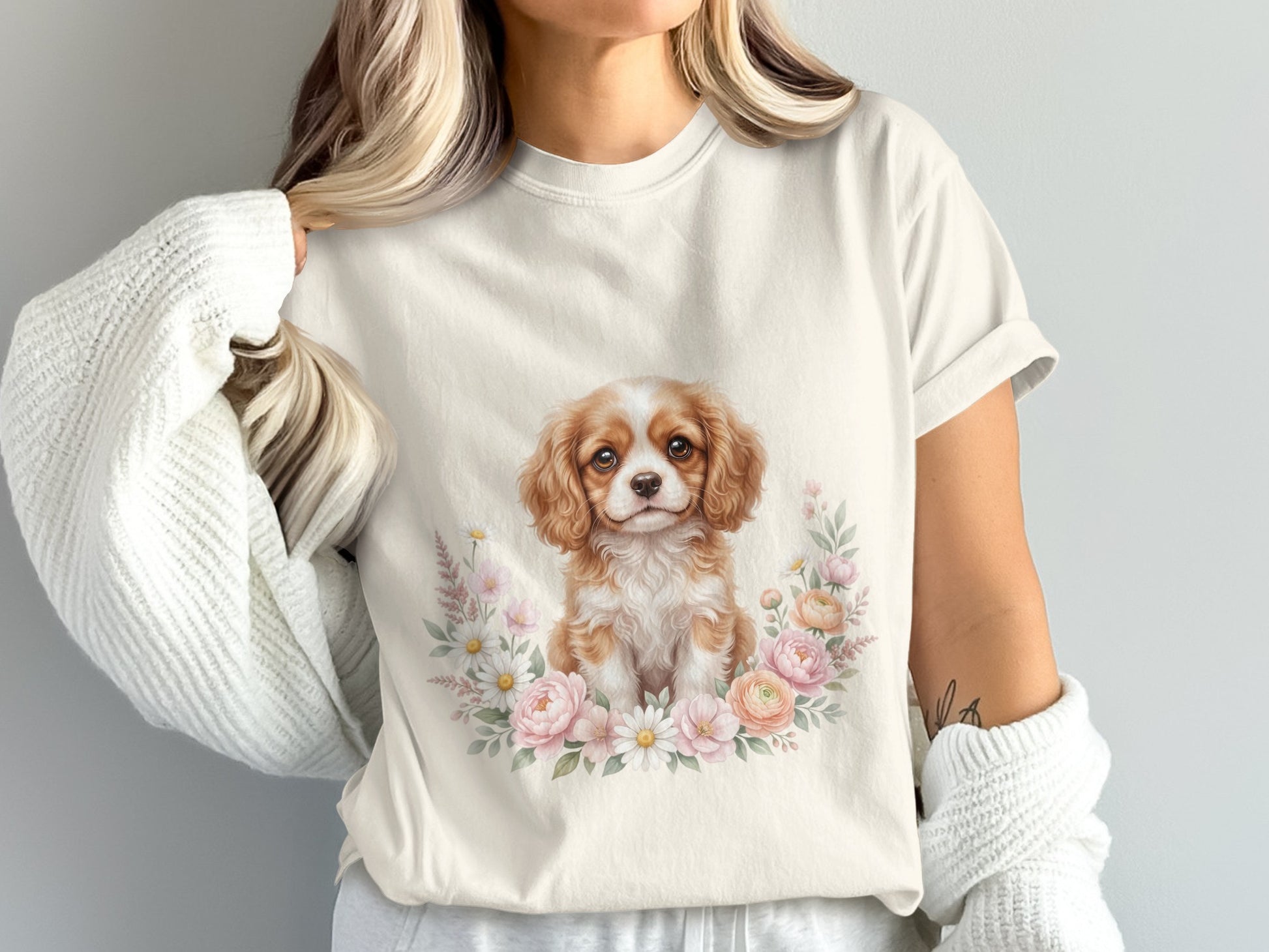 T-shirt with Cavalier King Charles Spaniel portrait surrounded by floral wreath.