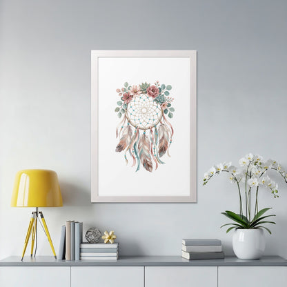 Framed artwork featuring a dreamcatcher with feathers, flowers, and succulents.