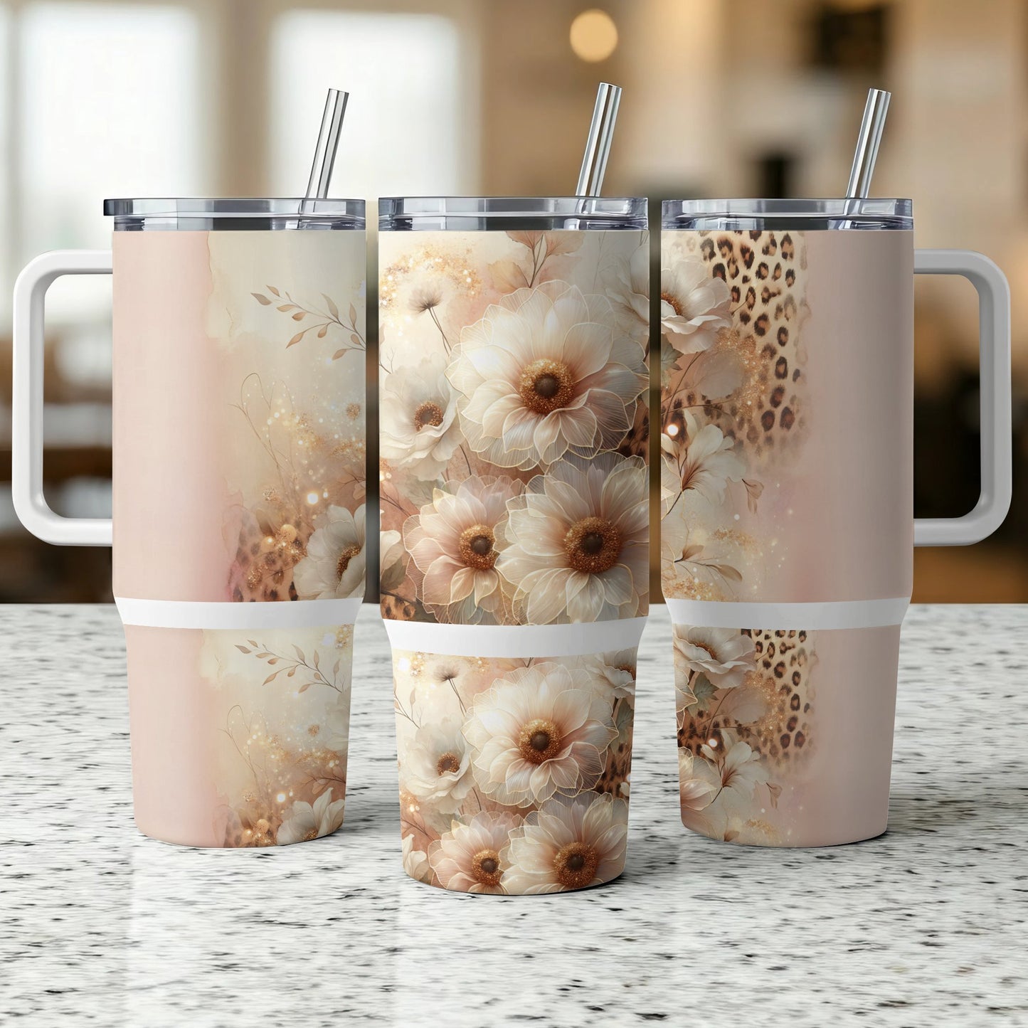 Floral and leopard print tumbler with straw on speckled counter.