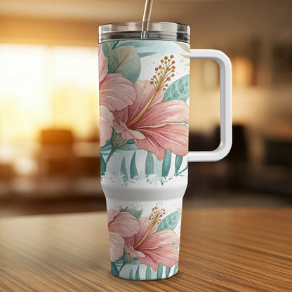 Large tumbler with pink hibiscus flowers and green leaves pattern.