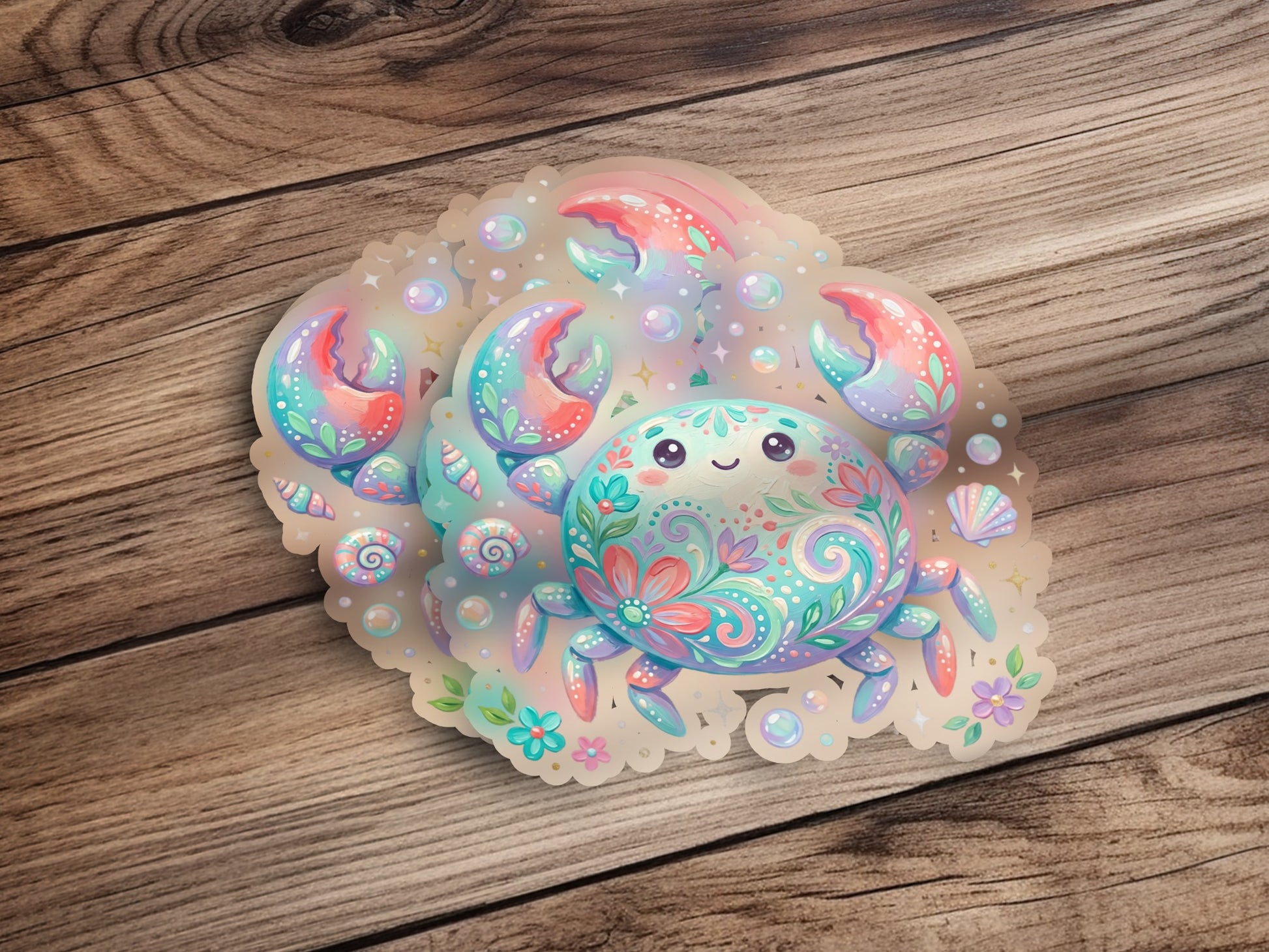 Cute cartoon crab sticker with floral and shell embellishments on wood.