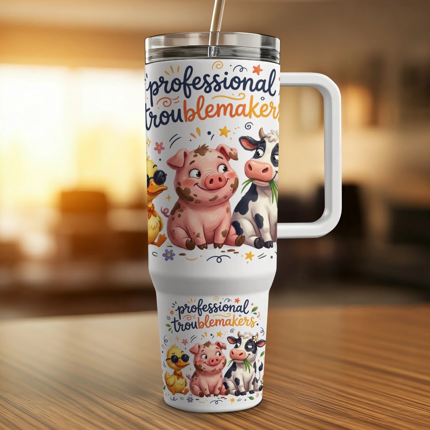 Tumbler with "professional troublemakers" text and cartoon farm animals.