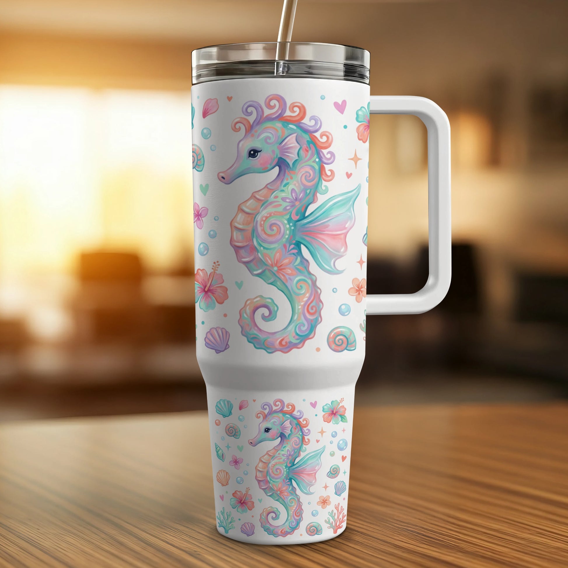 White tumbler with colorful seahorses, shells, and flowers design.
