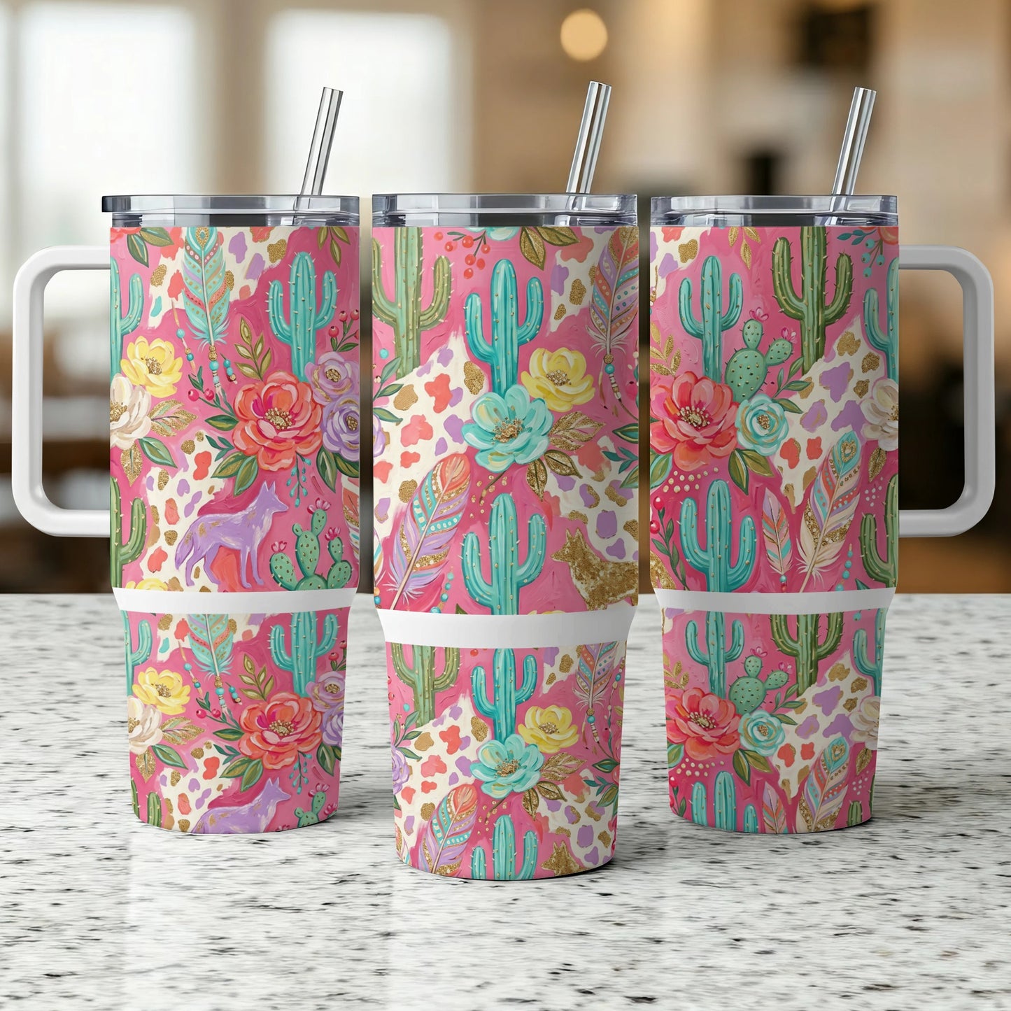 Three tumblers with floral, cactus, and animal pattern on a speckled surface.