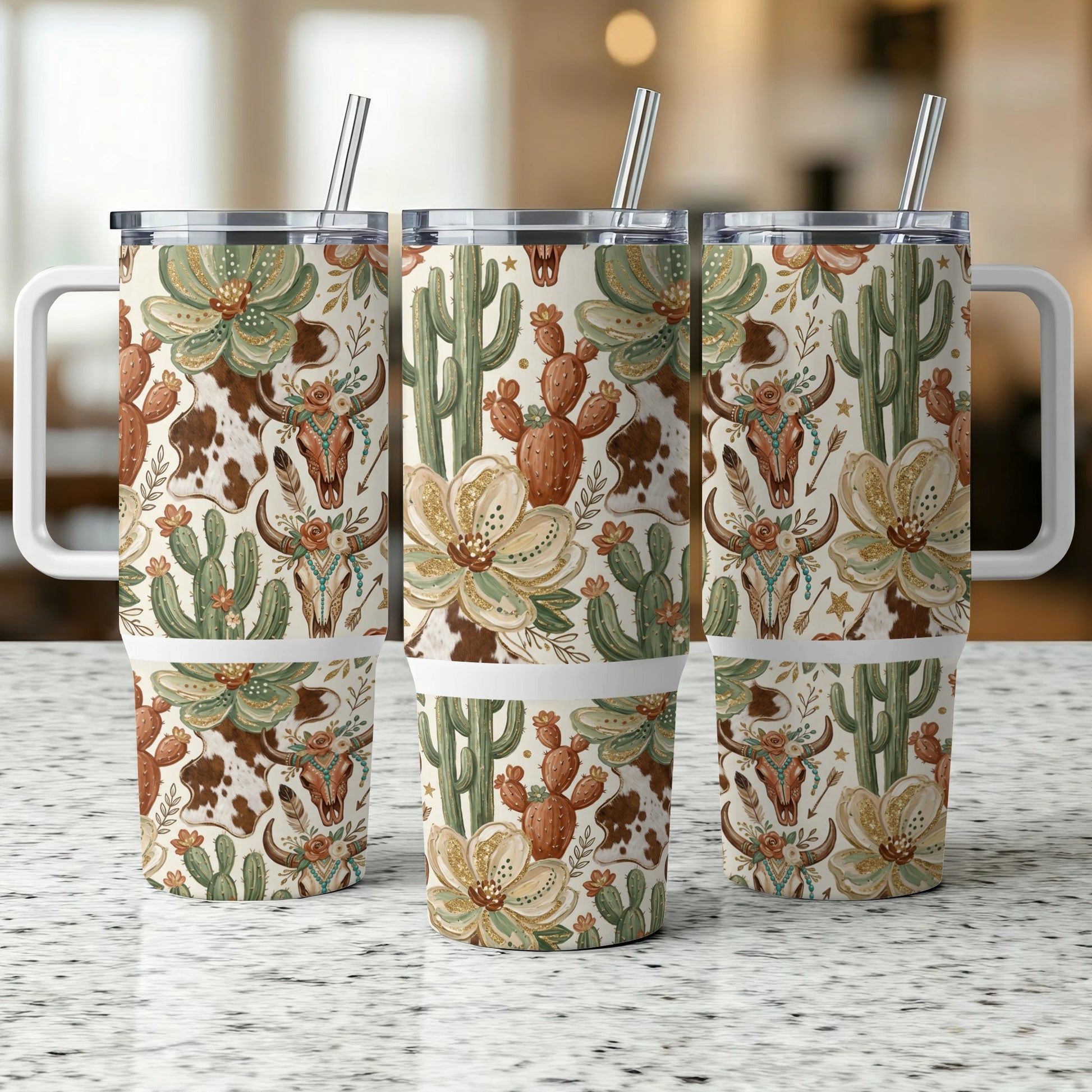 Three tumblers with a desert cactus and cow skull pattern.