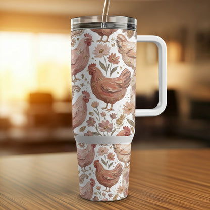 Floral paisley pattern with painted chickens on a white tumbler with handle.